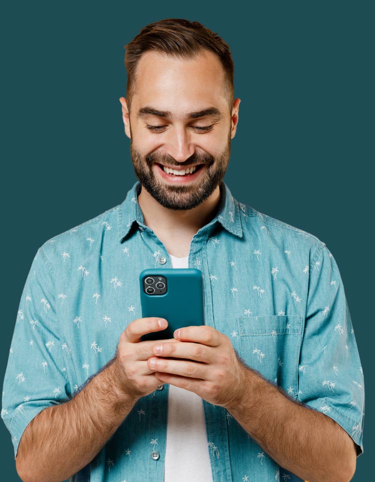 Smiling man with phone contacting 1 Day® Campaign Website company